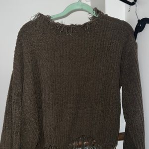 Green frayed sweater